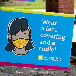  Picture of sign saying to wear a mask